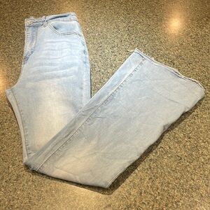 SHEIN size small light wash mom jeans High waisted Bootcut Raw hem Stretch